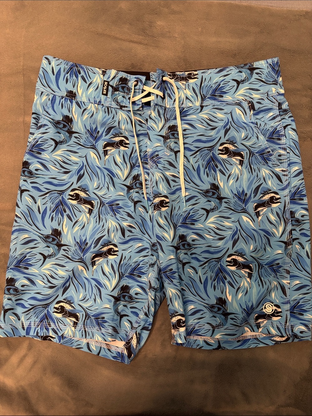 Scales Men's Blue Printed Board Shorts with tie waste.